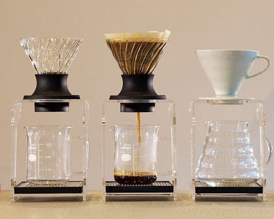 Hario Immersion Dripper Switch brewing coffee, glass cone on black silicone base